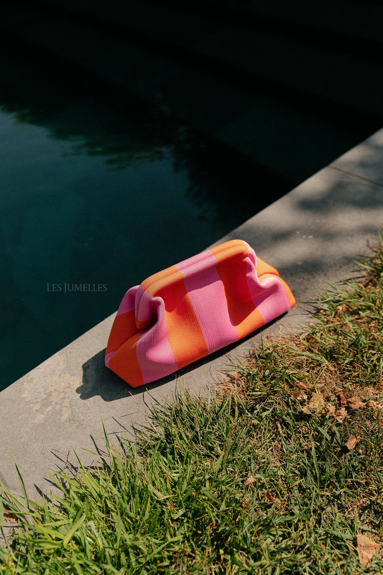 Striped beach clutch pink/orange