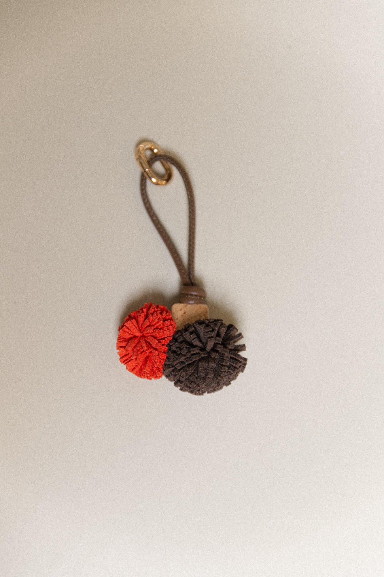 Pompon keychain brown/orange