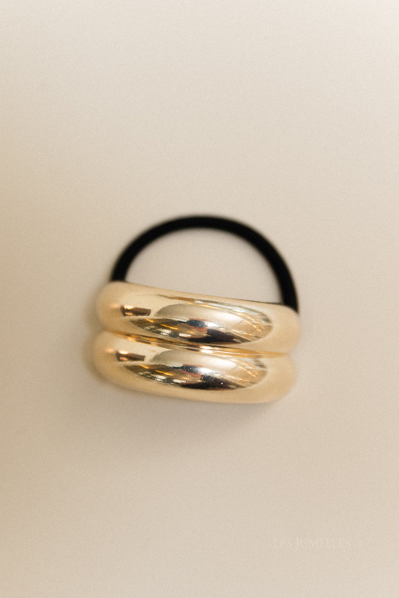 Gouden dubbel gebogen haaraccessoire met elastiek