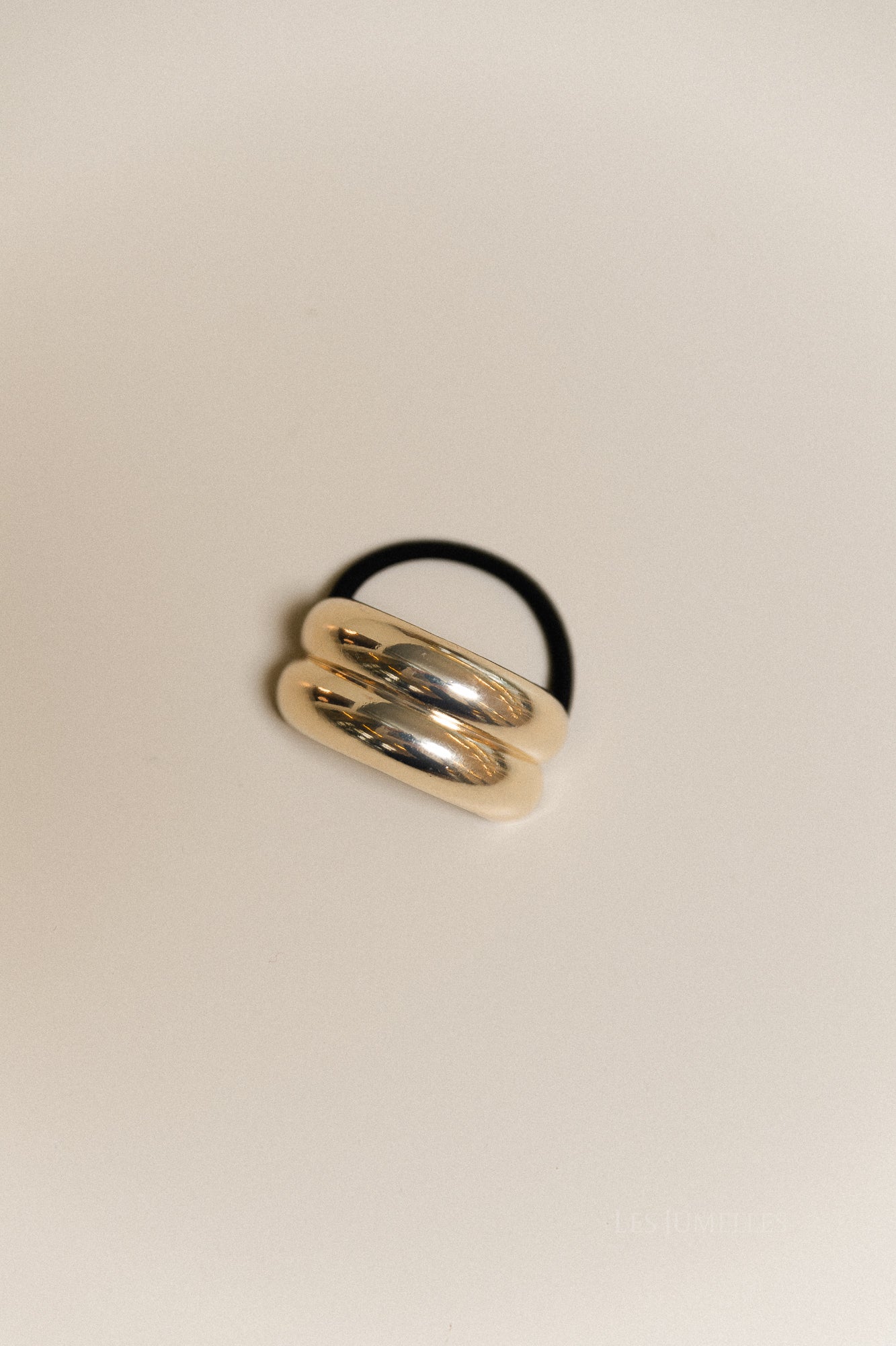 Gouden dubbel gebogen haaraccessoire met elastiek