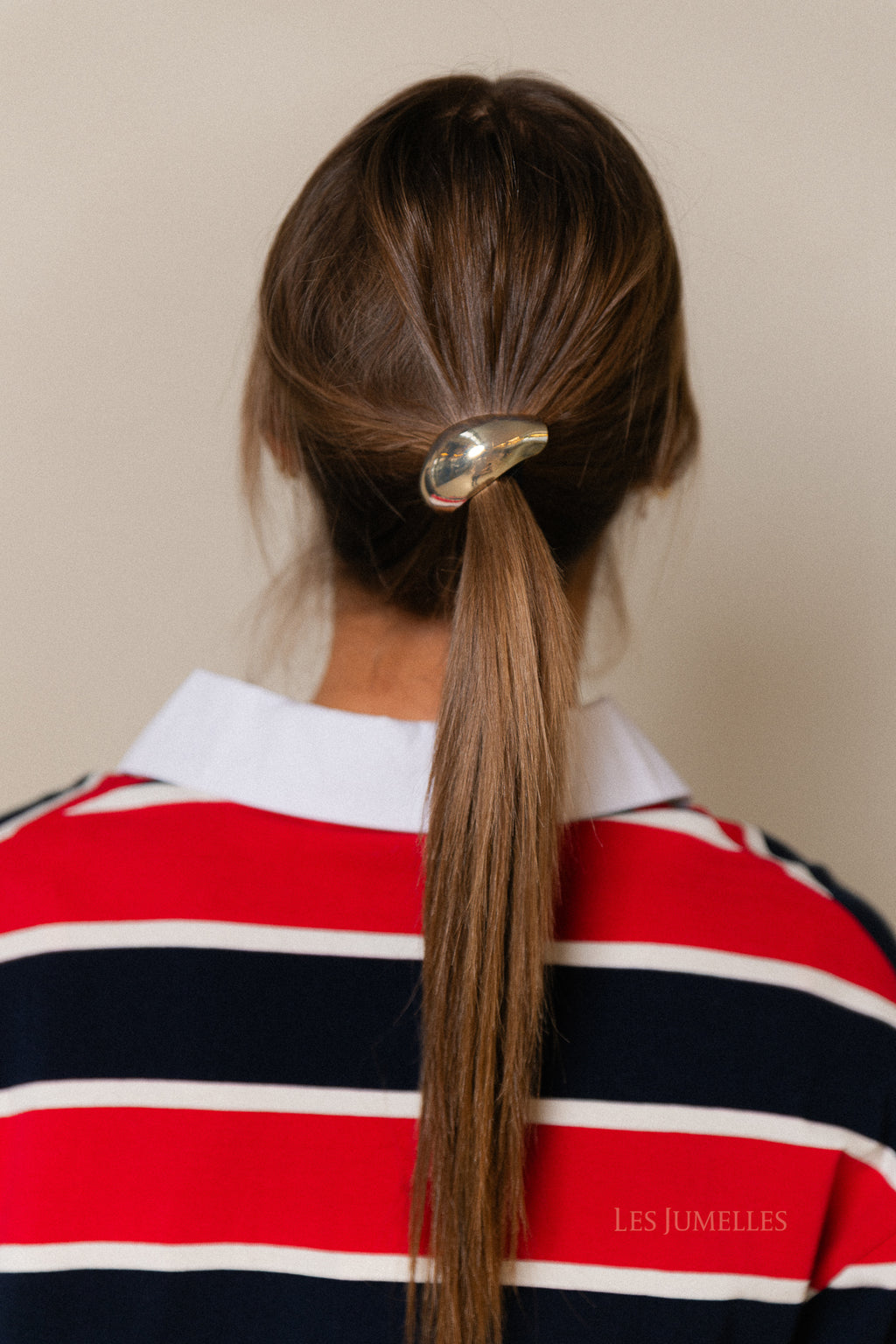 Gouden haaraccessoire met elastiek