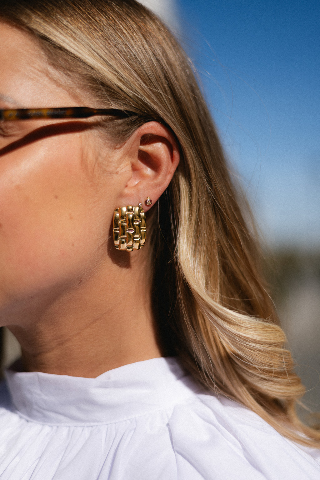 Bold woven statement earrings gold