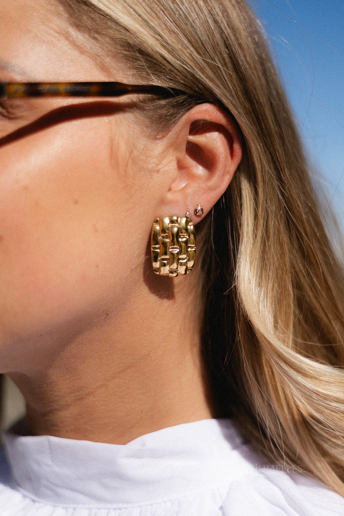 Bold woven statement earrings gold