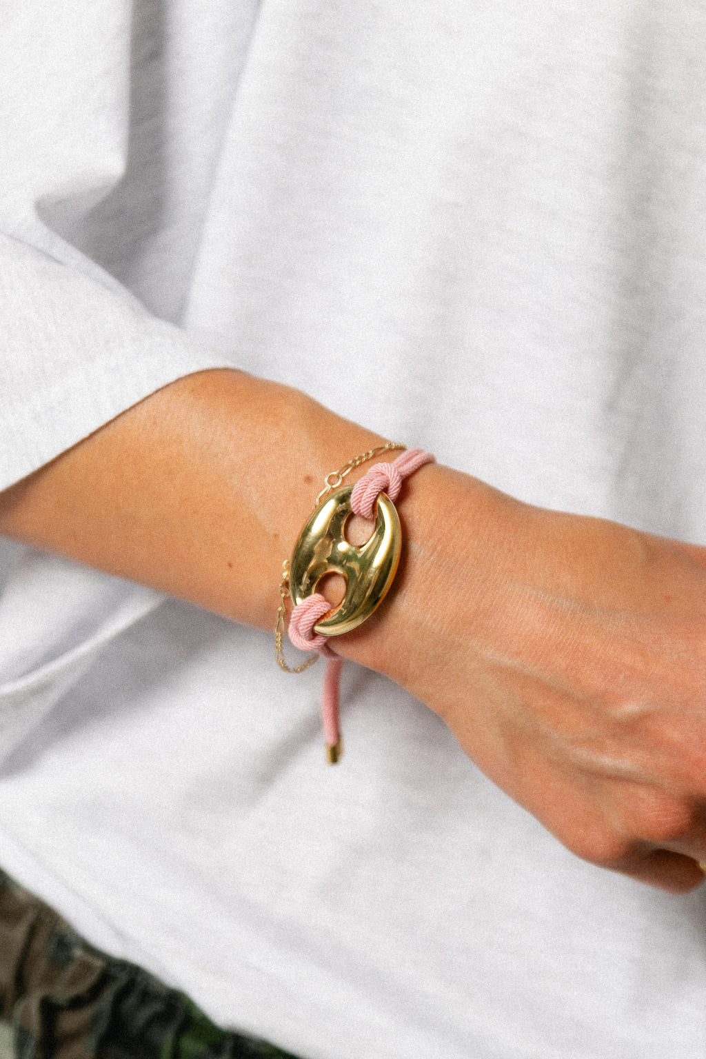 Cord bracelet with button detail dusty pink