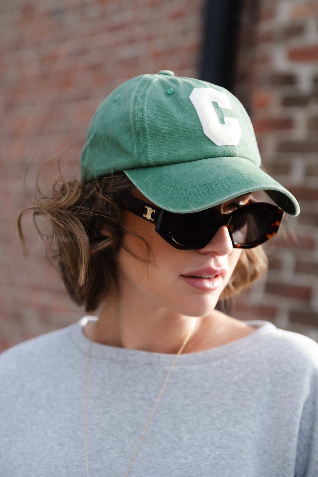 'C' Cap aus gewaschenem grünem Denim
