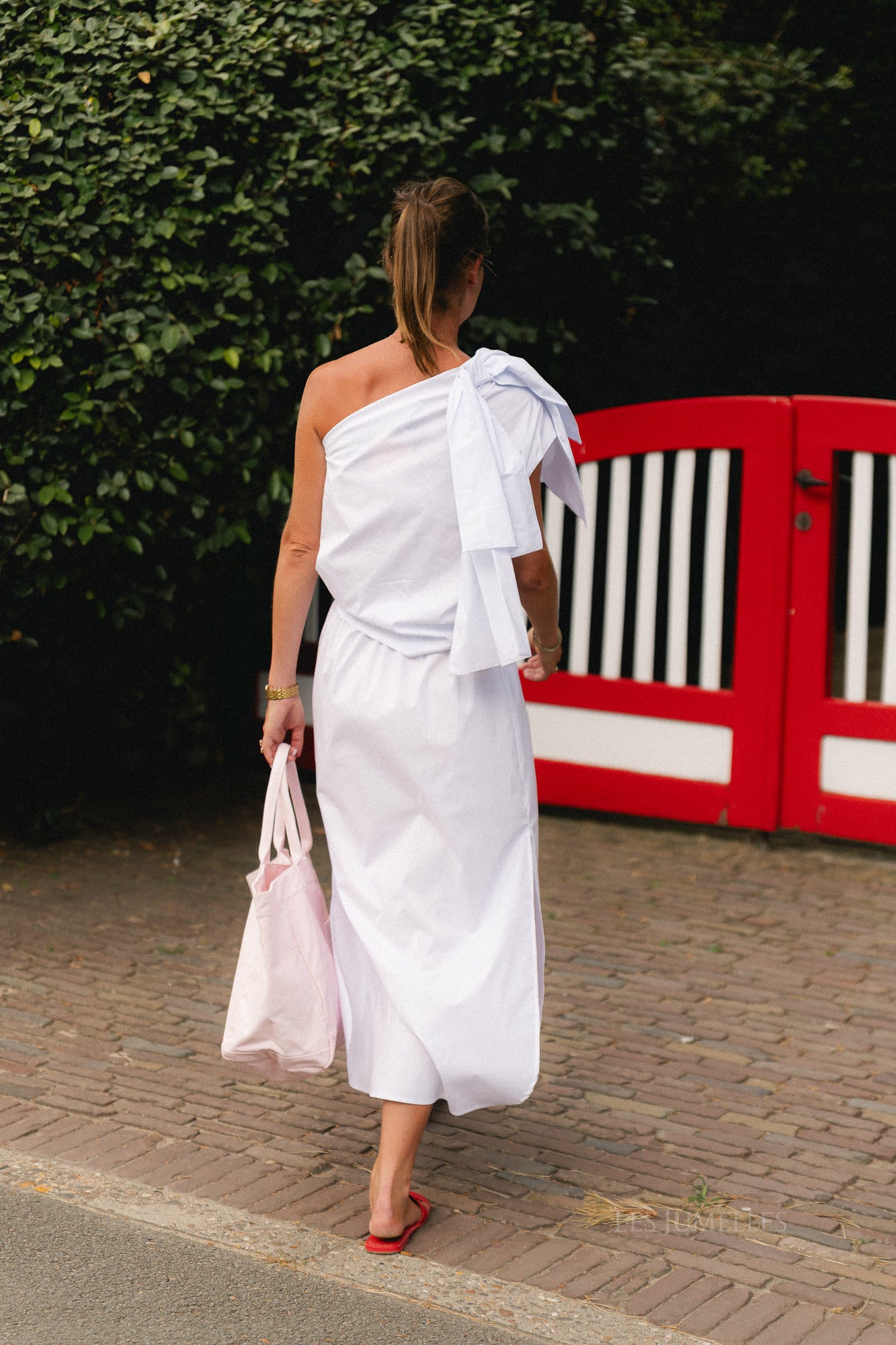 Britt one shoulder bow tie top white