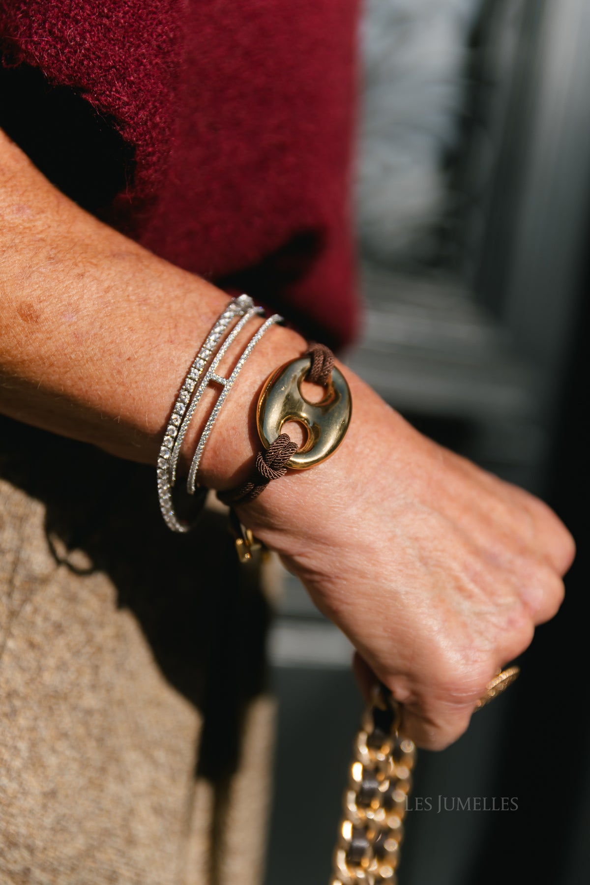 Cord bracelet with gold-tone bean detail brown